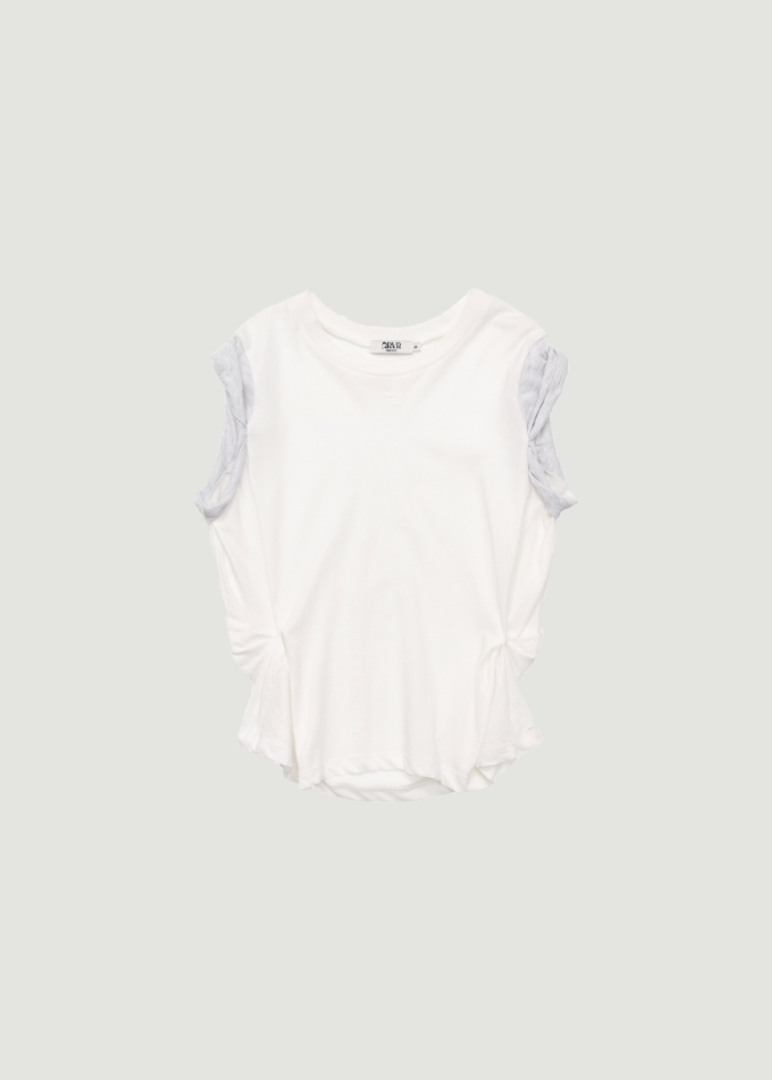 DELTA SLEEVELESS