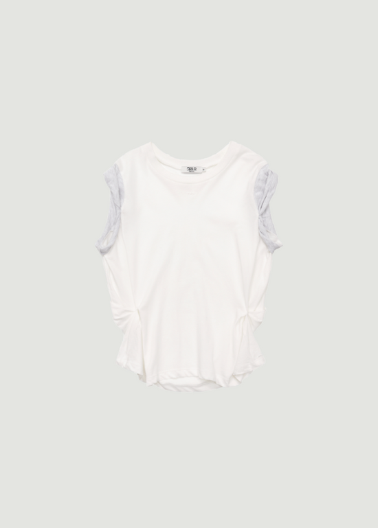DELTA SLEEVELESS